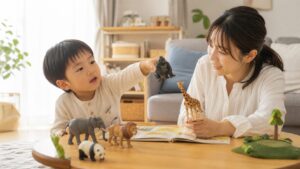 年中の子どもが母親と動物のおもちゃを使って英語でごっこ遊びをする明るい家庭の場面