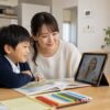 Laurus卒園後の子どもが家庭で英語絵本とオンラインの先生にふれながら英語時間を続ける場面